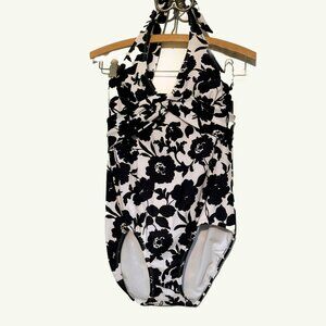1.	One piece swimsuit, black & white flowered print